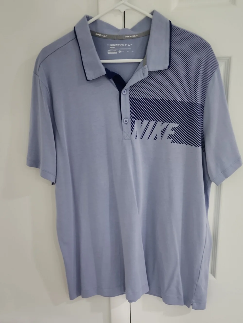 Nike Men's Light Blue Polo with Navy Graphic